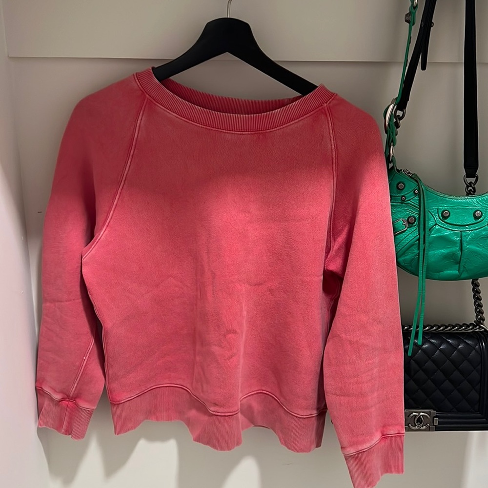 Free people red vintage wash sweatshirt.